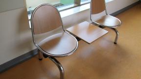 A seating area in a hospital corridor.