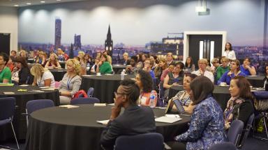 Women seated at an event