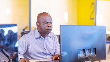 A man using a computer.