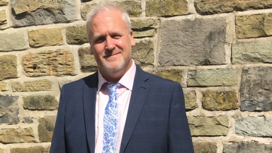 A photo of Dr Mark Buchanan