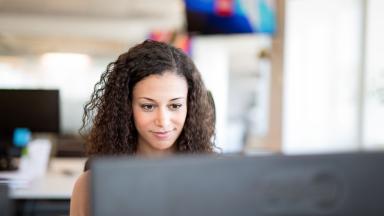 Office worker computer smile