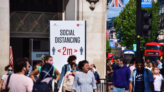 Social distancing sign crowd