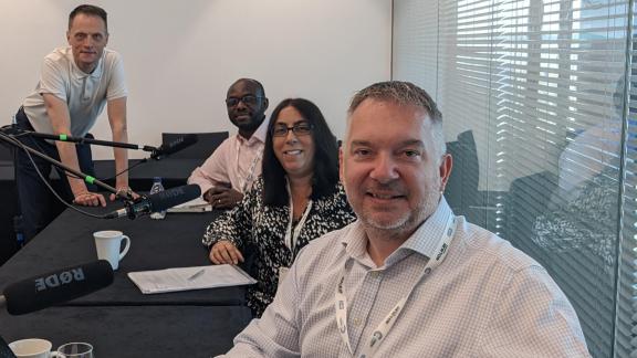 Matthew Taylor, Tayo Kufeji, Louise Ansari and Simon Whitehouse sat at table with audio recording equipment