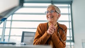 A smiling general practitioner.