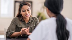 Two women having a conversation.