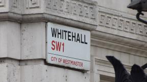 A sign reading "Whitehall, SW1, City of Westminster".