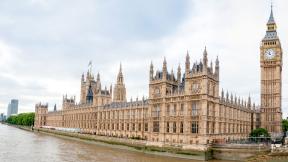 The Houses of Parliament viewed from across the River Thames.