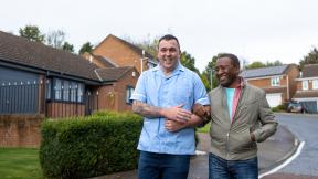 Community nurse walking with a service user