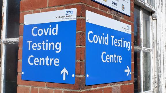 A sign which says "COVID testing centre".
