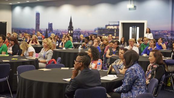 Women seated at an event