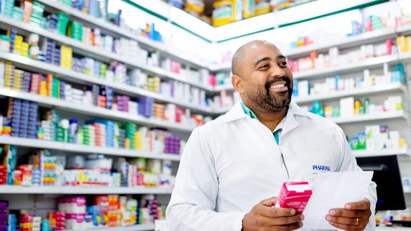 A smiling pharmacist.