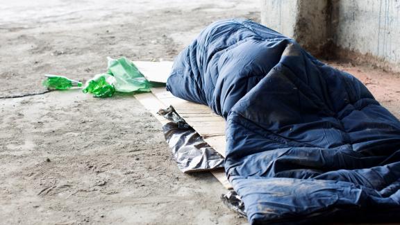 Rough sleeper in sleeping bag