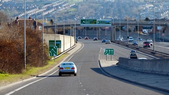 A car entering a motorway via a sliproad.