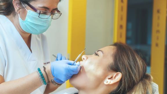 A dentist treating a patient.