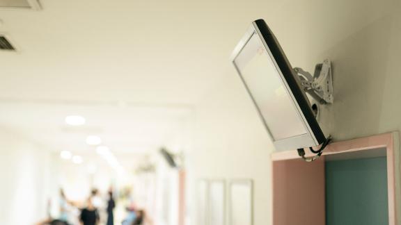 A monitor in a waiting room.