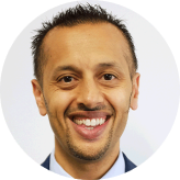 Headshot of Mani Dhesi