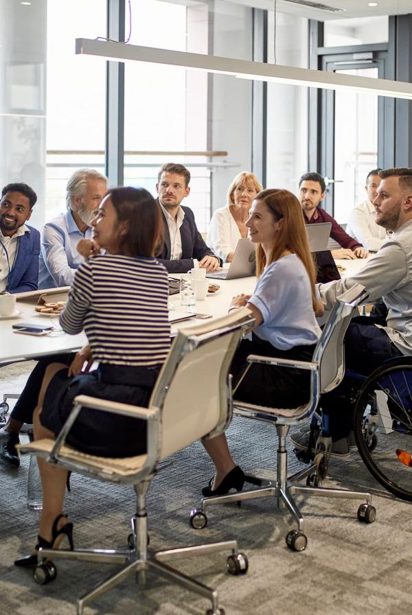 Members meeting around a table 
