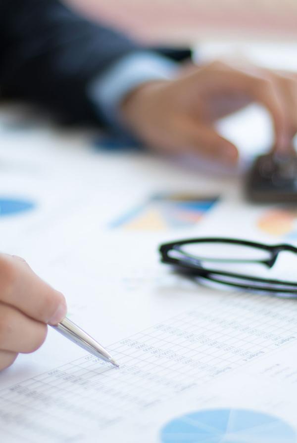 A man checking financial graphs.