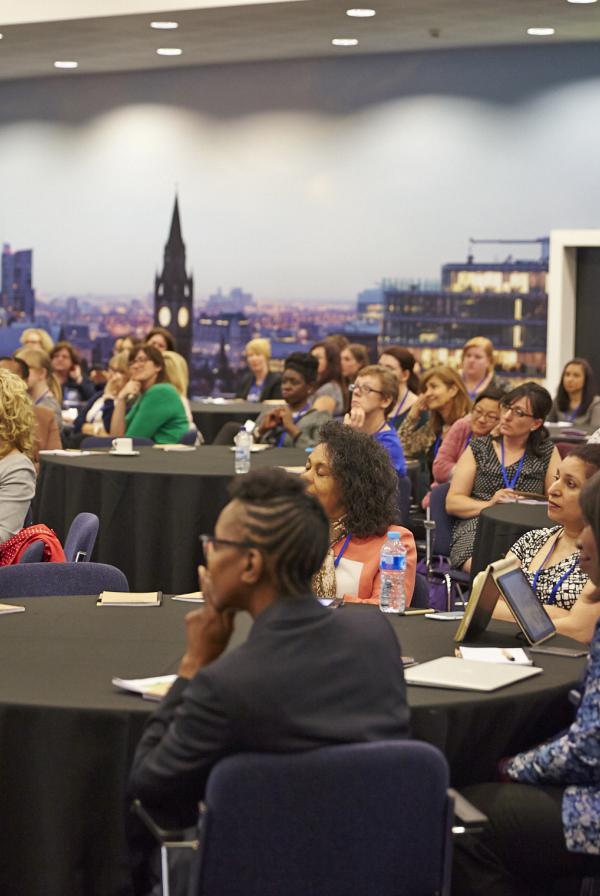 Women seated at an event