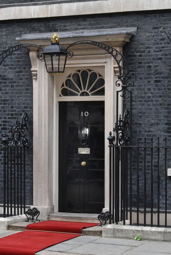 10 Downing Street with red carpet up to the door.