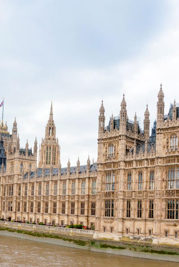 The Houses of Parliament viewed from across the River Thames.