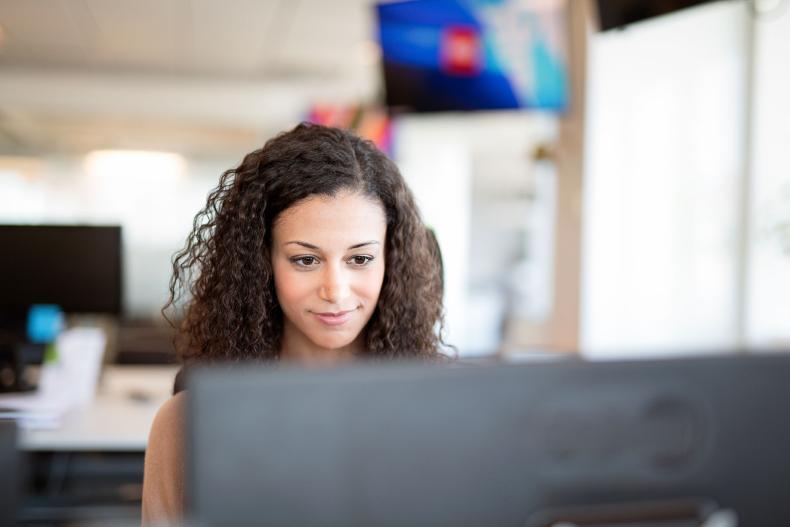 Office worker computer smile