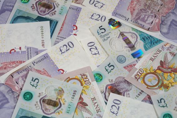 An assortment of UK bank notes.
